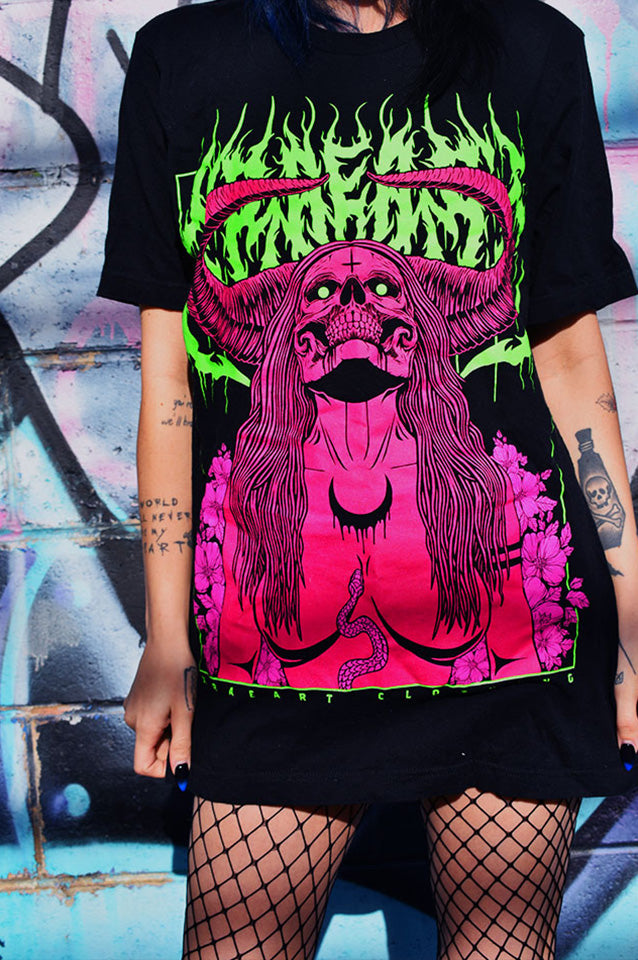 Succubus Witch demon in neon green, hot pink, magenta on black t-shirt with flowers and horns. Tattoo inspired Dark art tee for Mental Health by Xraeart Clothing alternative streetwear.